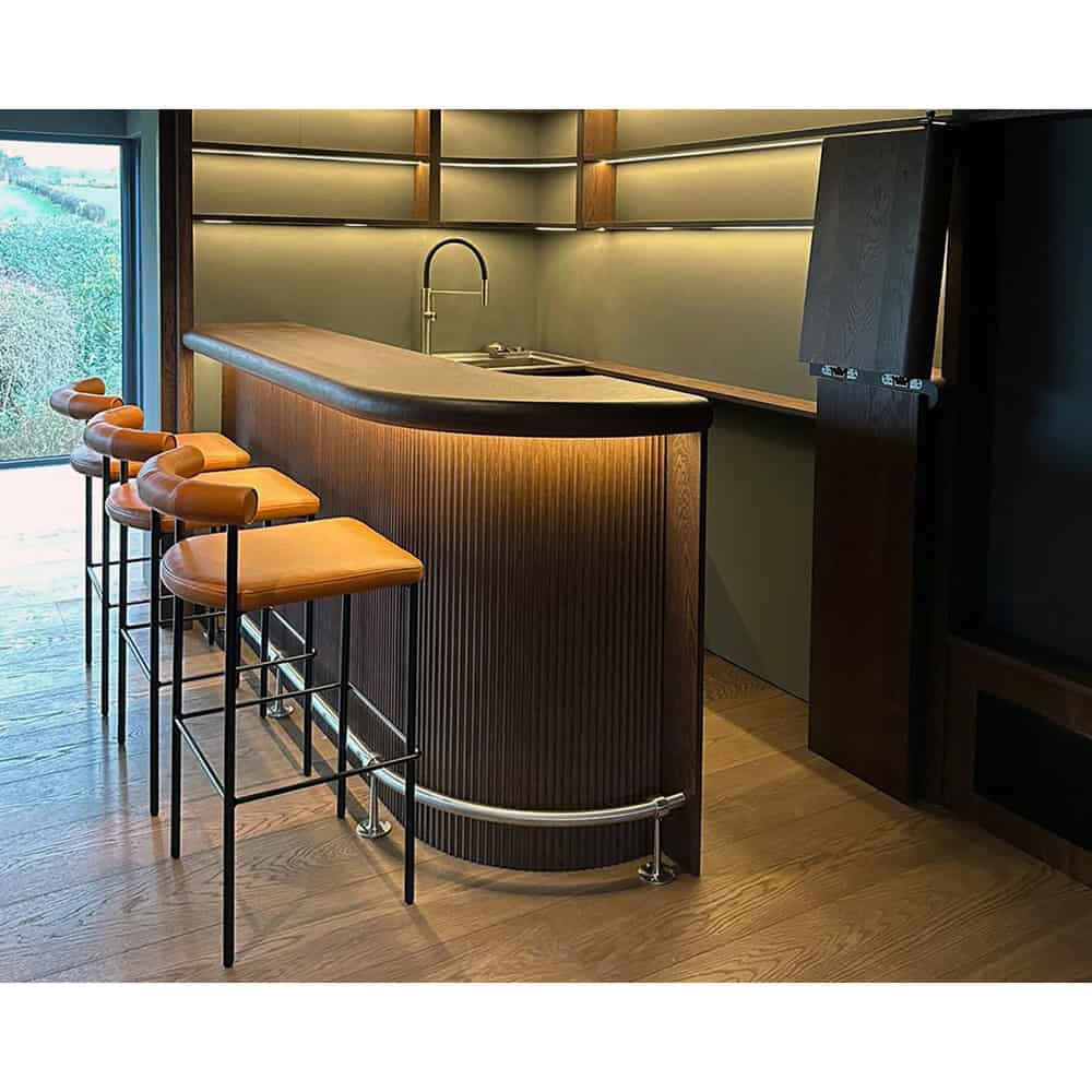 Custom curved stainless steel foot rail by Knaresborough Engineering (Yorkshire) Limited. Custom curved stainless steel foot rail by Knaresborough Engineering (Yorkshire) Limited.